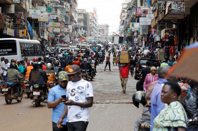 Motorcycle taxis carry passengers following a resurgence of Ebola involving the Bundibugyo strain, a rare variant of the virus with no approved vaccine currently available, along Ben Kiwanuka street in Kampala, Uganda May 21, 2026. REUTERS/Abubaker Lubowa